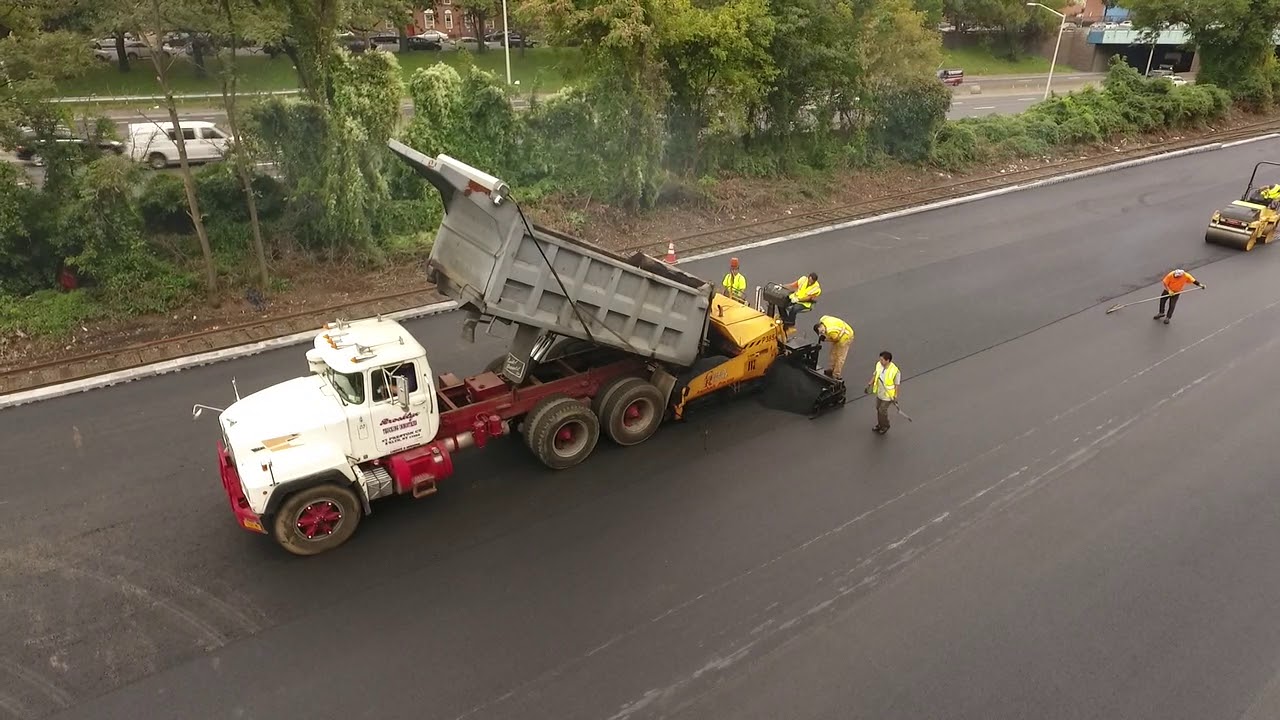 New concrete sidewalk installation with formed edges and finished surface